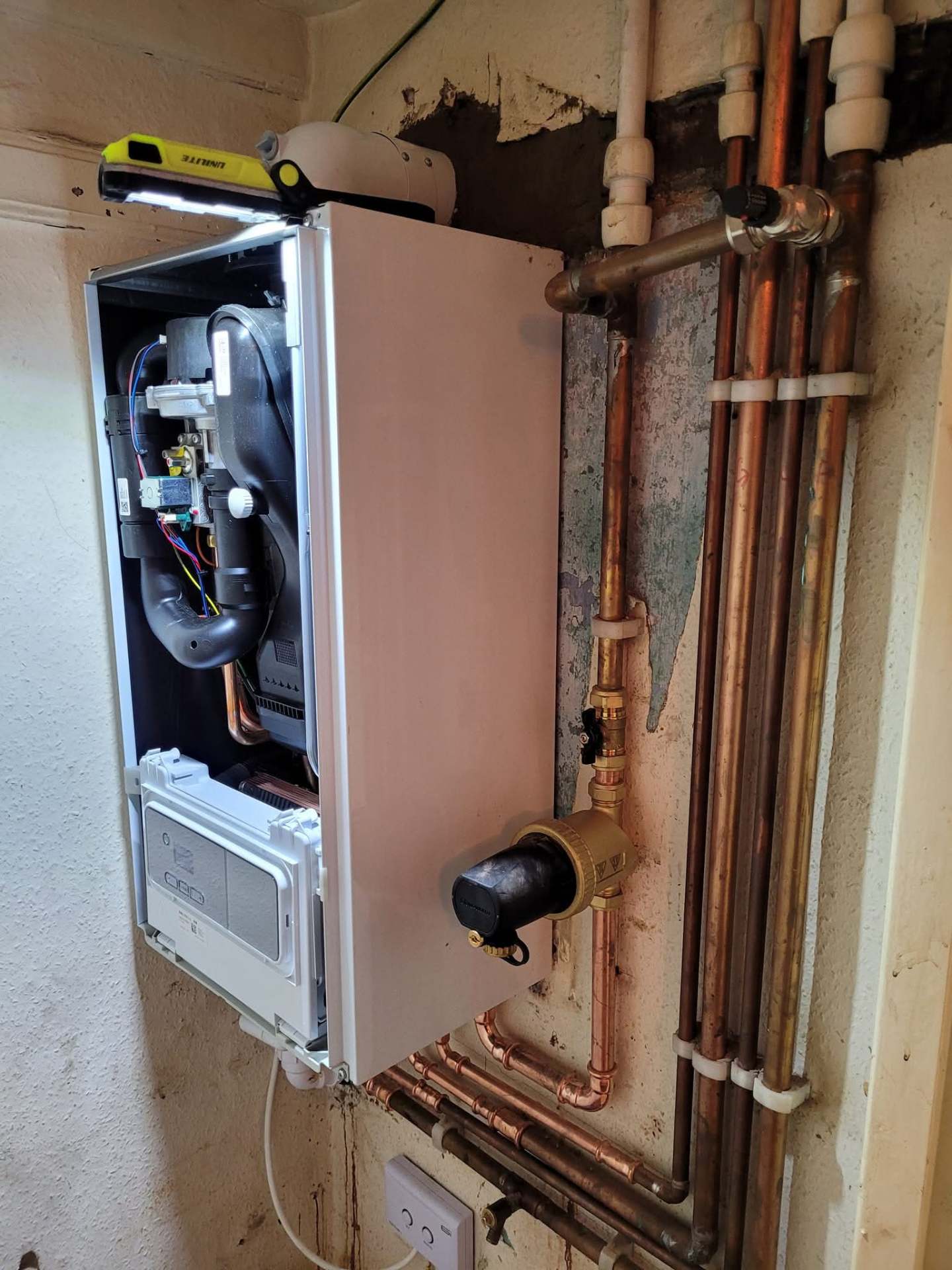 Boiler isolation valves and copper tails exposed for a same-day repair
